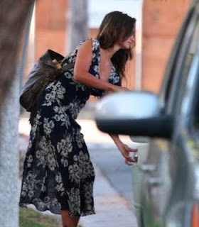Penelope Cruz seen getting into a vehicle. Ergo, she must be pregnant.