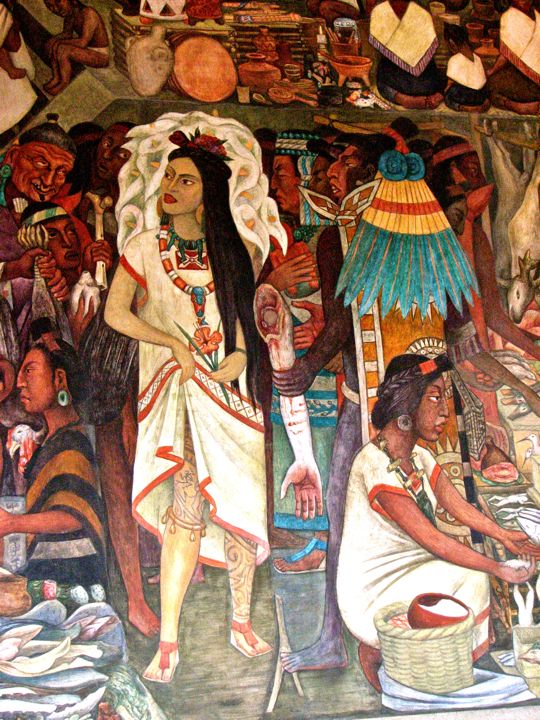 This is a detail from one of the famous Diego Rivera murals at Mexico Palacio Nacional in Mexico City. It depicts a Mexica woman, probably a prostitute, displaying the intricate tattoos on her legs to potential customers. One warrior offers her a human arm for her services.Rivera modeled this woman after his wife artist Frida Kahlo