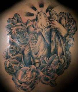 Black and Grey Religious Tattoo Design