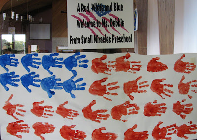 photo of: Children's Painted Handprints Create American Flag