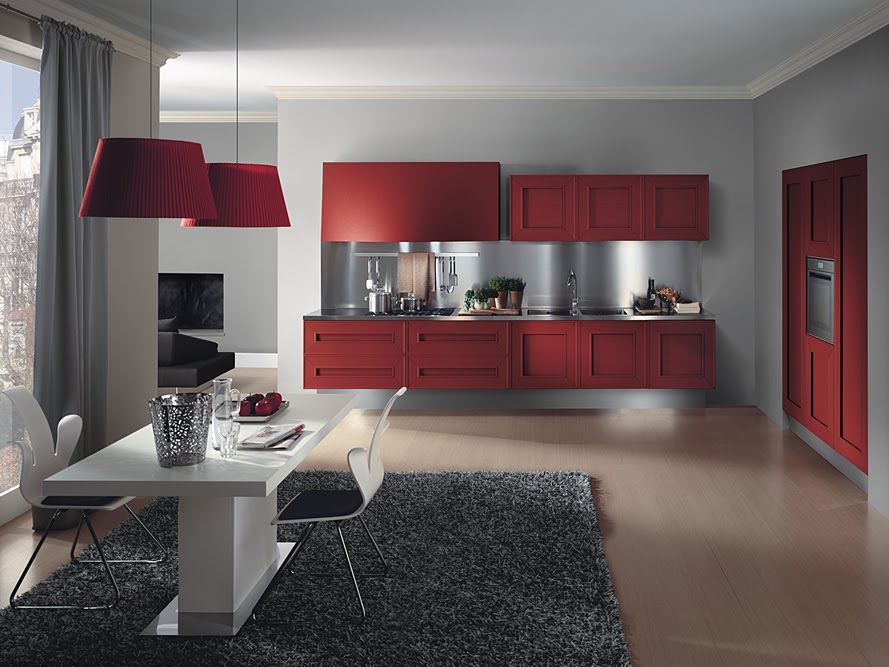 Muebles de cocina en color rojo con fondo metálico e iluminación Muebles de cocina en color rojo con fondo metálico e iluminación