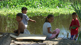 Kids by lily pond