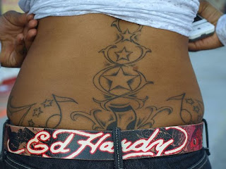 http://2.bp.blogspot.com/_veDbg4Zs4Sg/S1RKH4ggAfI/AAAAAAAADVQ/TTdK-y_0y_E/s320/Star-lower-back-tattoo-3.jpg