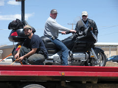Bike on Tow Truck - unloading in Laramie, Wyoming