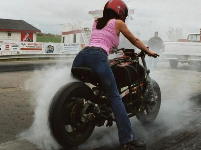 Woman+in+tight+jeans+making+a+motorcycle+smoke+2.jpg