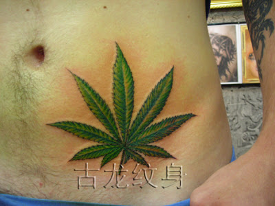 Leaf tattoo design on the hip