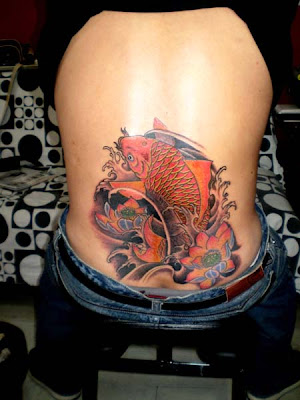 koi tattoo design on the hip