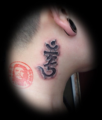 Sanskrit tattoo behind the ear