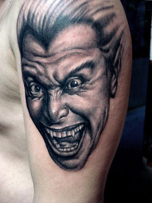 vampire tattoo on the arm