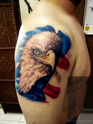 A typical American symbol eagle tattoo. The color of this tattoo is vivid, 