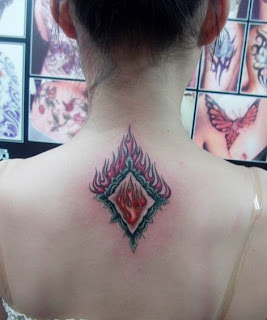 a totem like fire tattoo design