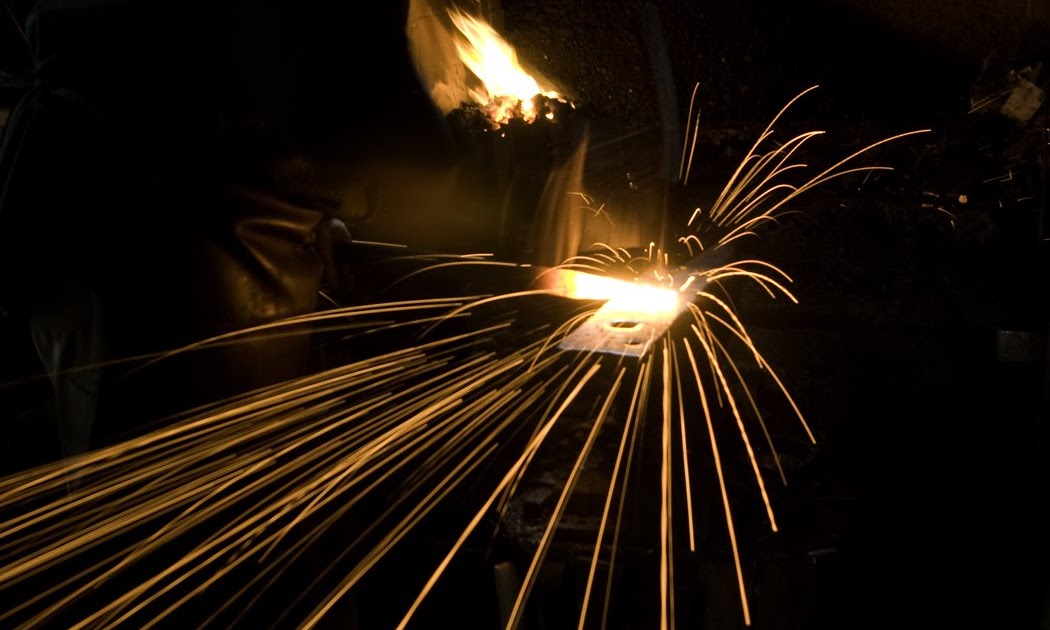 Rural Blacksmith Welding Wrought Iron