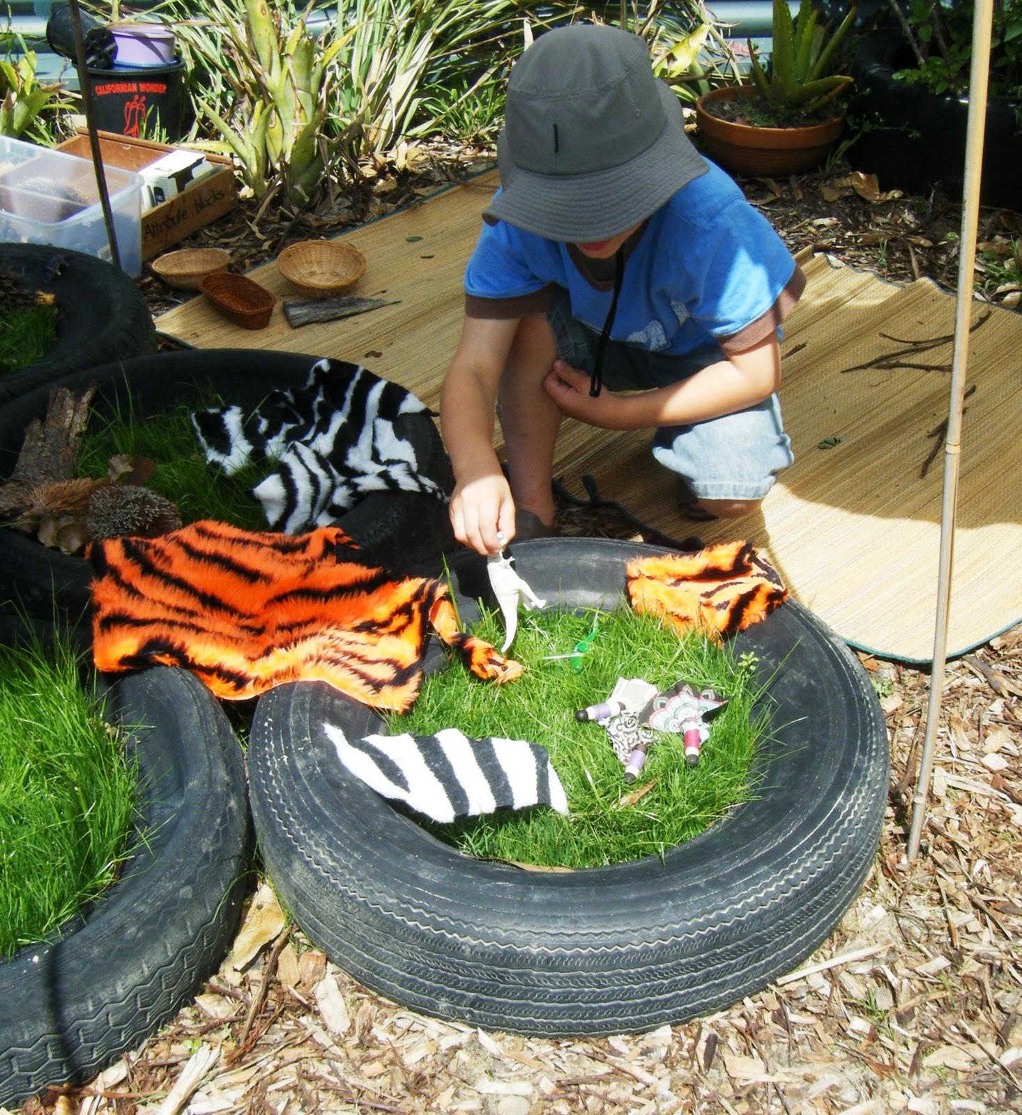 let the children play imaginative play in a tyre
