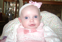 Brinlee playing on Moms lap