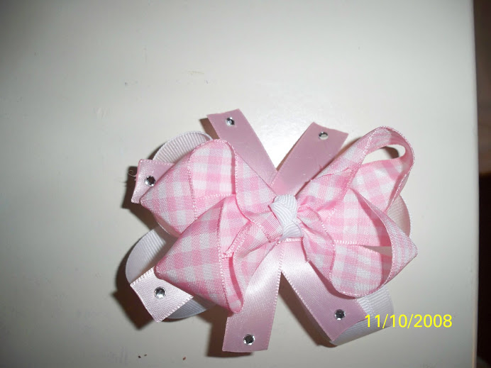 White and Pink Gingham bow (005 $12.00 on headband $8.00 on clippie)