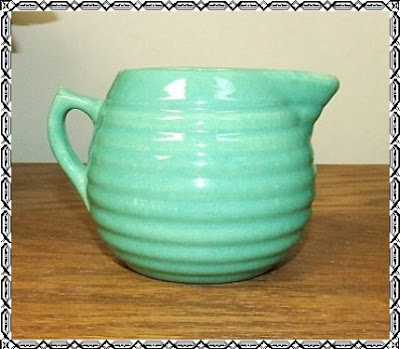 Large vintage USA pottery, peach glazed vase with scalloped edge: $38 from HighStreetMarket.