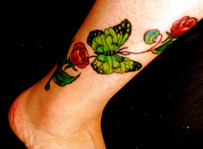 flower ankle tattoos. tattoos butterfly eggplant