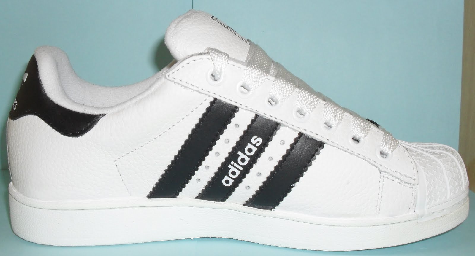 tenis adidas cabecao