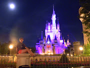 . gorgeous night with a bright moon shining next to the Disney Castle. (dscn )