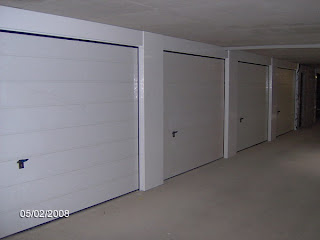 Modelos de puertas de garaje - My Comunidad - Barrio de la Fortuna