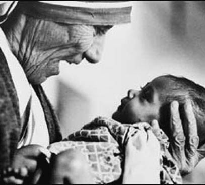 [2008-10-mother_theresa_with_armless_baby-737350.jpg]