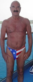 G. Gordon Liddy strikes rugged pose in good old fashioned American flag speedo - Photo courtesy of dcrtv.com