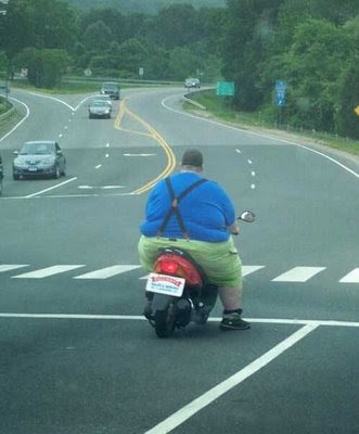 fat guy on motorbike