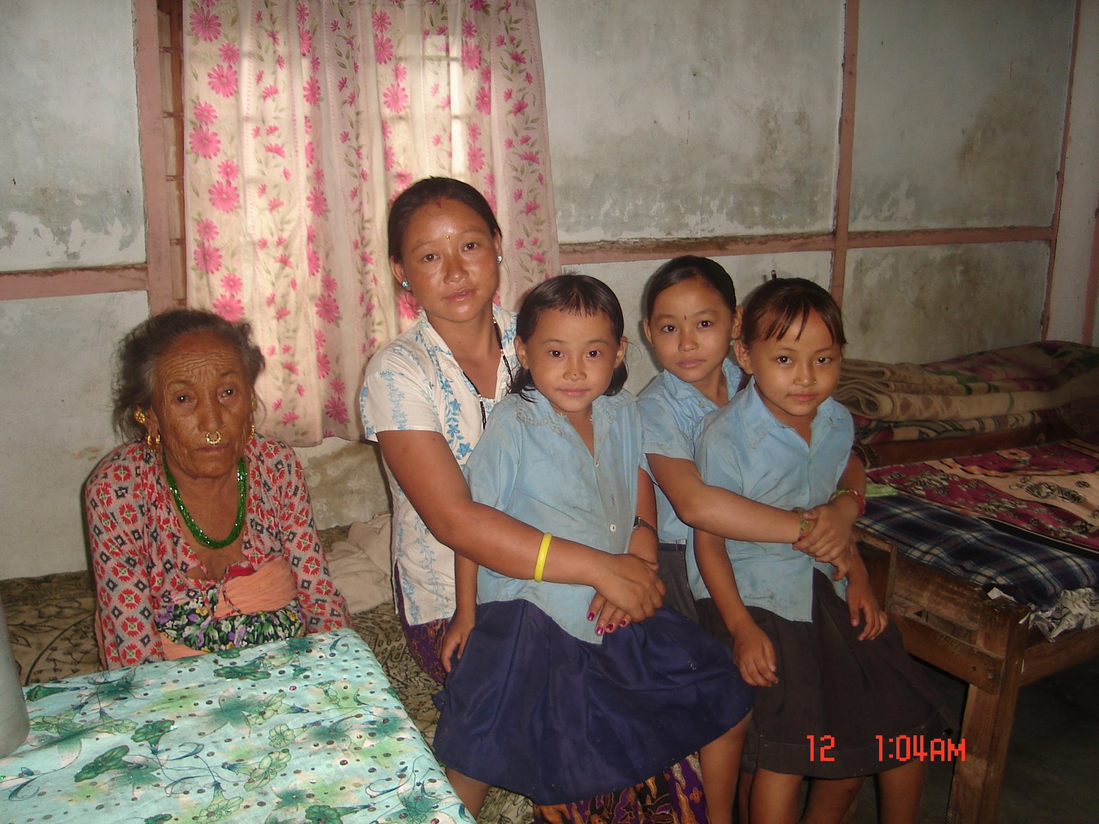[Nar+Kumari+Limbu+with+her+dauthers+and+mother+in+law.JPG]