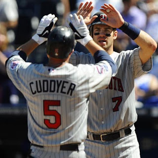 Joe Mauer and Cuddyer on the Field at Twins Spring Training