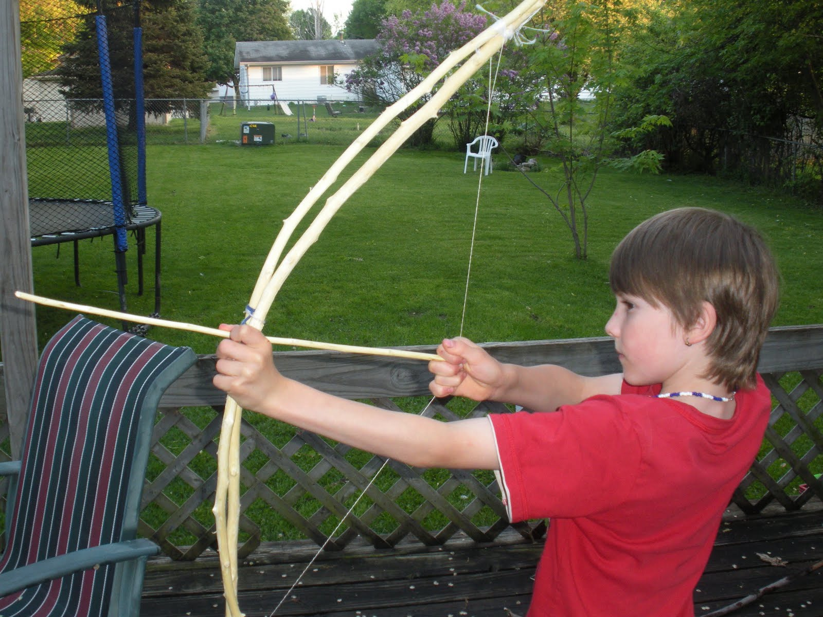 Heather's Moving Castle Boys with homemade bows and arrows