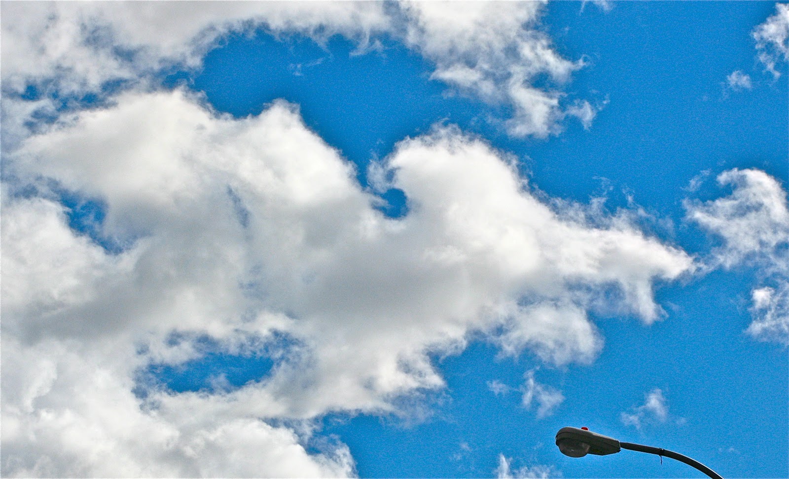 MARGARET GOSDEN 2 SKY WATCH FRIDAY SEEING FACES IN THE CLOUDS...