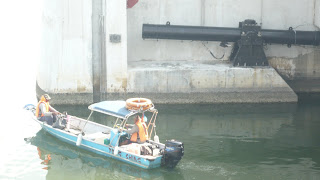 maintenance boat at one of the flood gates