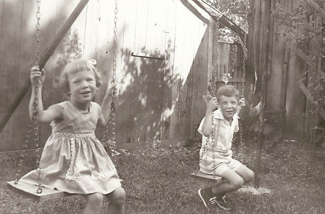 Granddaddy Wolfe built this swing set for us.