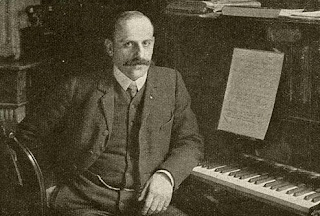 Charles Grelinger in 1907 in zijn studeervertrek
