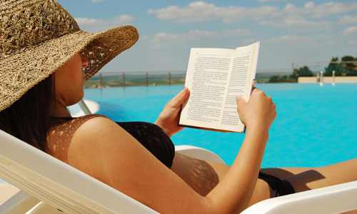 Forumo parašai Shutterstock_32156380_girl+reading+book+in+beach+chair