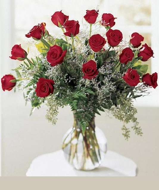 الوردةُ الحمراءُ للشاعر سعيد القاضى Pictures-of+flowers_+Red+Roses_bouquet