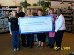 Presented check to Autism Society of Illinois