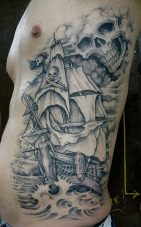 lettering tattoos on ribs. Pirate ship on the ribs