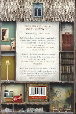 Back cover of a book, showing various miniature room settings.