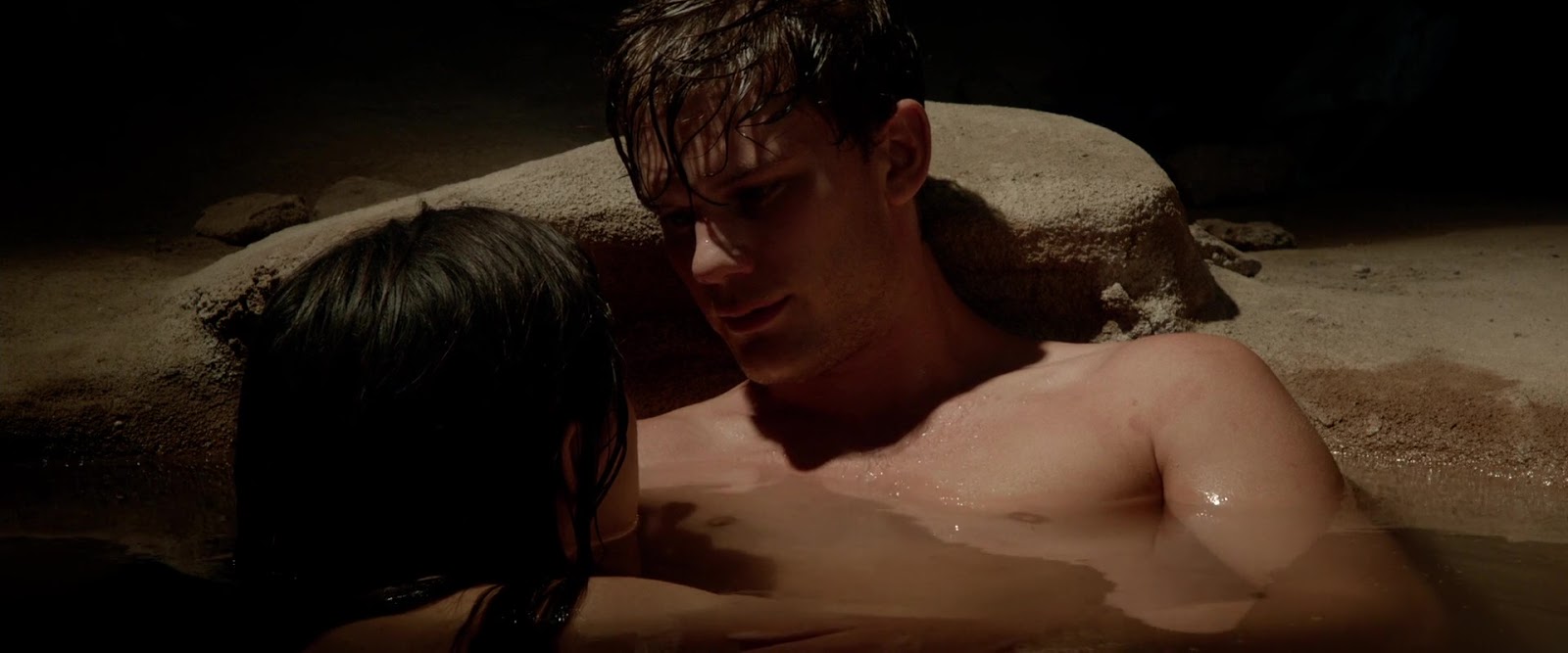 Jeremy Irvine shirtless in Beyond The Reach.