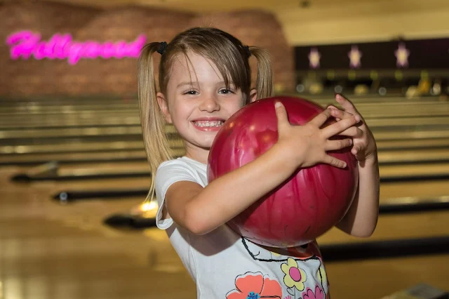 A child bowling at Hollywood Bowl Dagenham