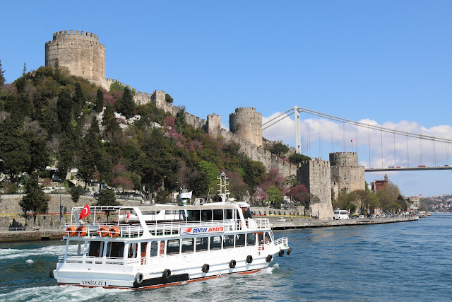 Heading back to Galata Bridge along Bosphorus Strait to see Asian side of Istanbul in Turkey Heading back to Galata Bridge along Bosphorus Strait to see Asian side of Istanbul in Turkey
