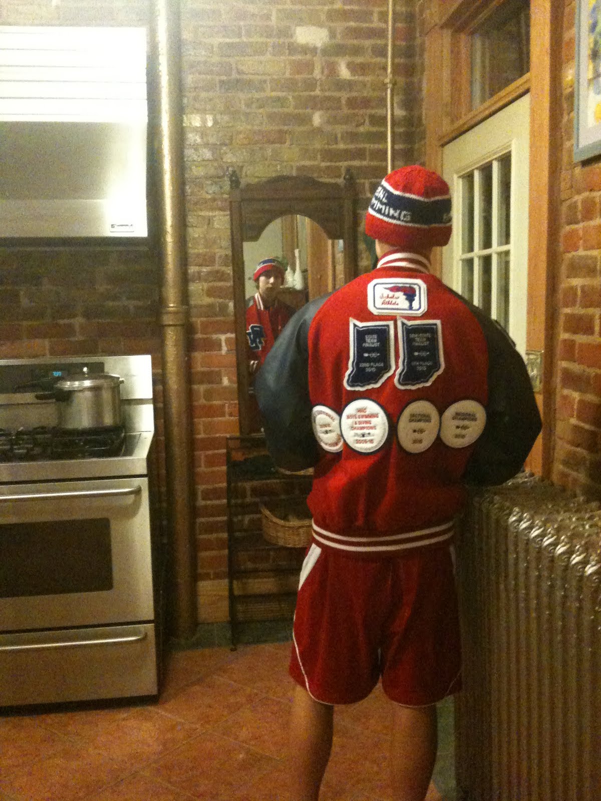 Old Jail Arts Sewing Patches on Letter Jackets