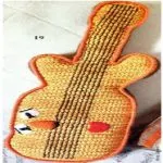 http://www.crochetkingdom.com/crochet-guitar-toy-pattern/