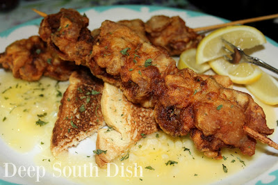 New Orleans restaurant favorite, seasoned oysters and bacon are threaded on skewers, passed in a buttermilk egg wash and dredged in flour and fried. Serve with a lemon butter sauce, toast points and lemon wedges.