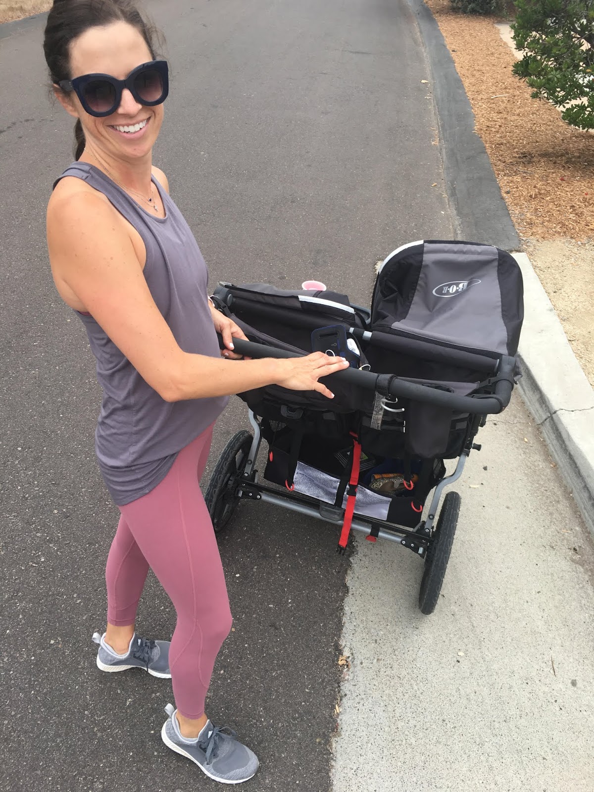 mom and double running stroller