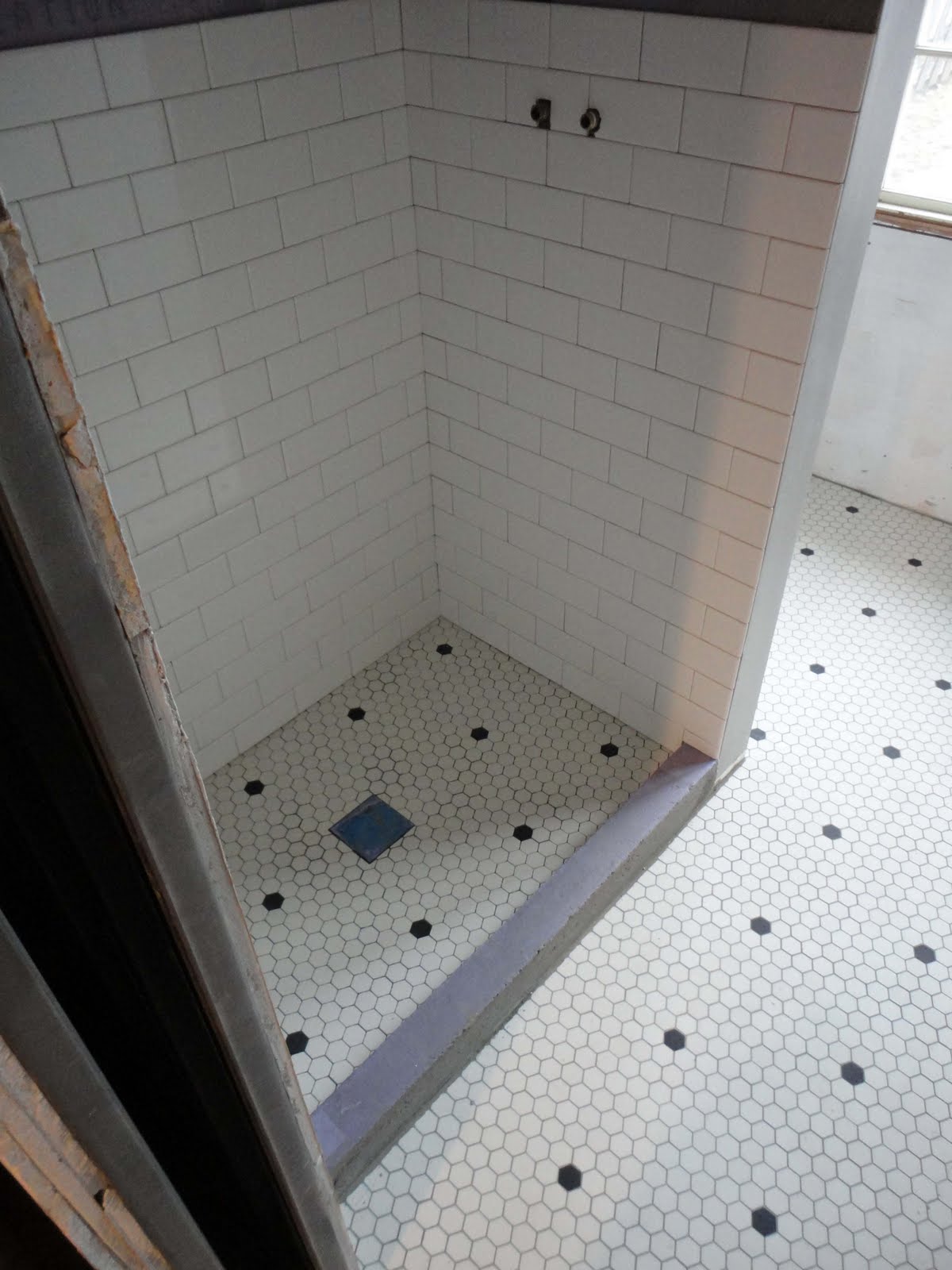Corner of 9th and Paradise Hex Floor Grouted & Subway Tile