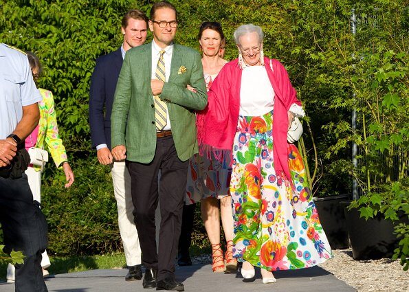 Queen Margrethe attended the World Ballet 2019 at Mollerup Estate. Queen's gold earrings and floral summer skirt