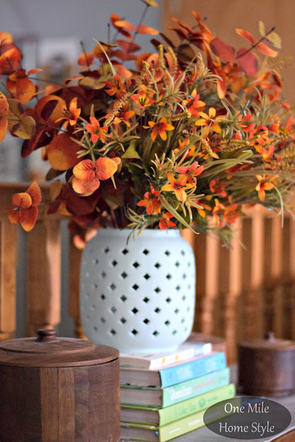 Fall flower arrangement in a light blue vase - One Mile Home Style Fall Home Tour