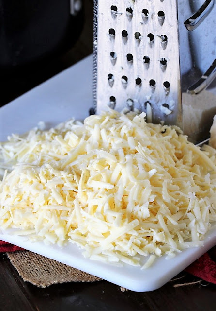 Shredded White Cheddar to Make Baked Macaroni and Cheese Image